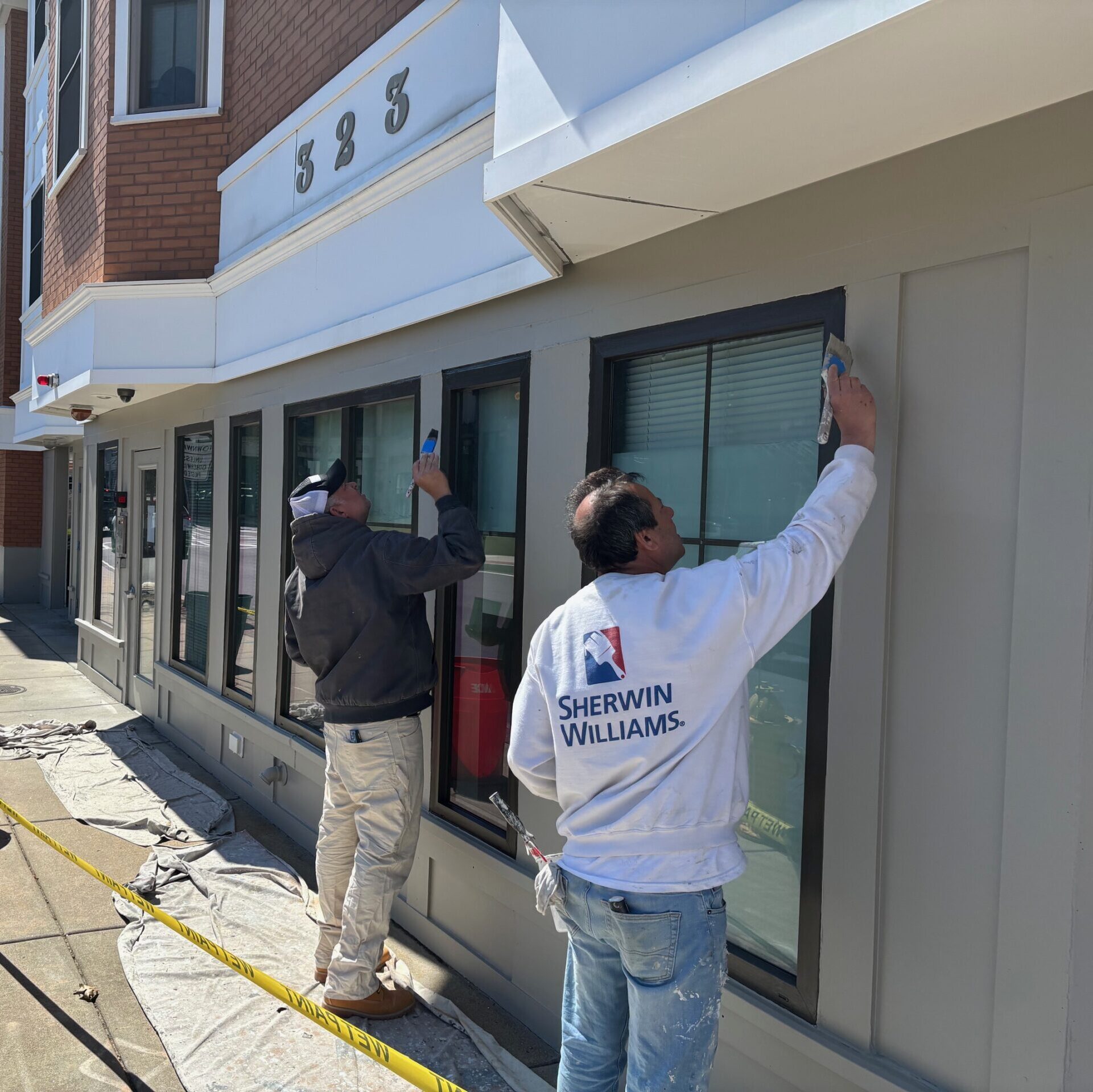 Painting a storefront in Dedham